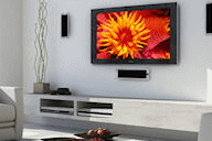 LCD TV mounted on a white wall